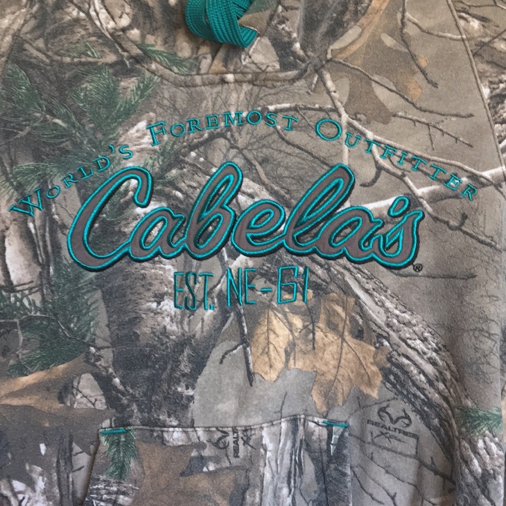 Cabela’s camo hoodie with teal lettering